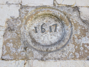 1617 plaque on Old School House Wall